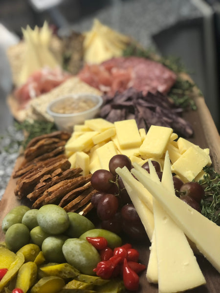 Characuterie platter curated from The Cheese Wegde's find foods and gourment cheese's